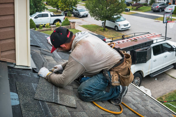 Professional Gutter Repair And Installation technician working in Moonachie, NJ